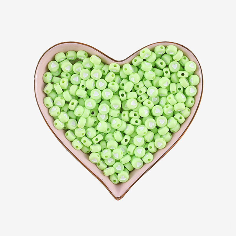 Perles Rondes Pistache Coeur Blanc