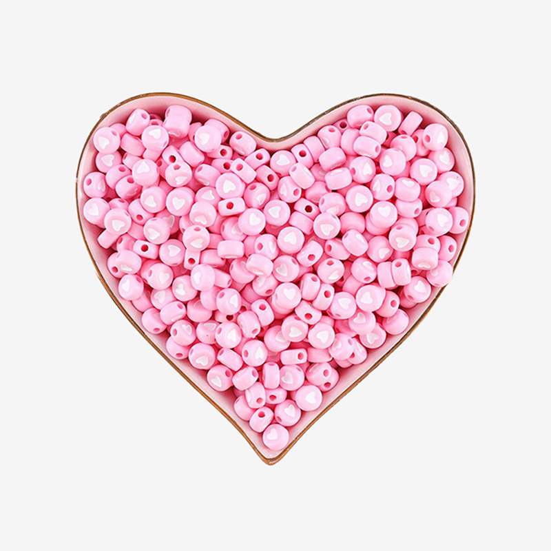 Perles Rondes Rose Dragée Coeur Blanc